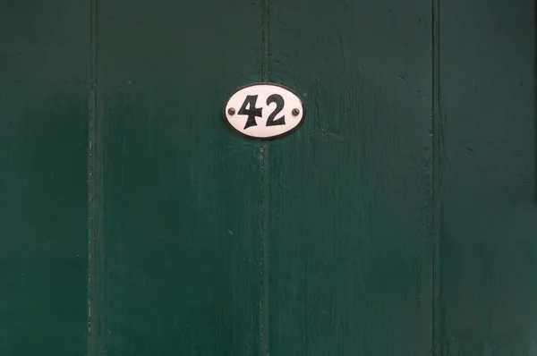 Close up of Door number 42 for use as a background — Stock Photo, Image