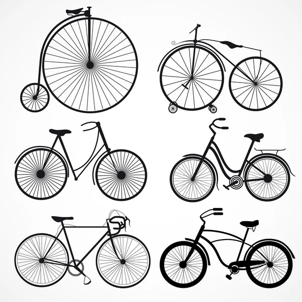 Set of bicycles on a white background — Stock Vector
