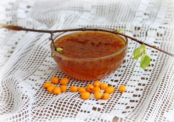 Sea buckthorn jam with branch — Stock Photo, Image