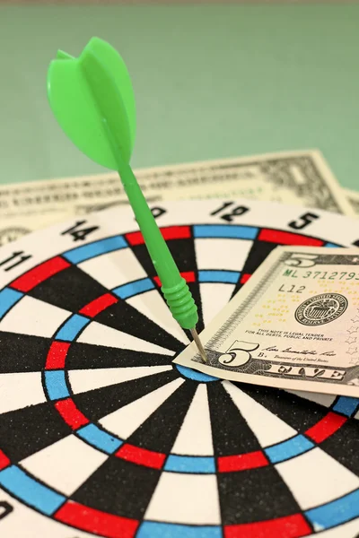 Concept of business success - dart and dollar — Stock Photo, Image