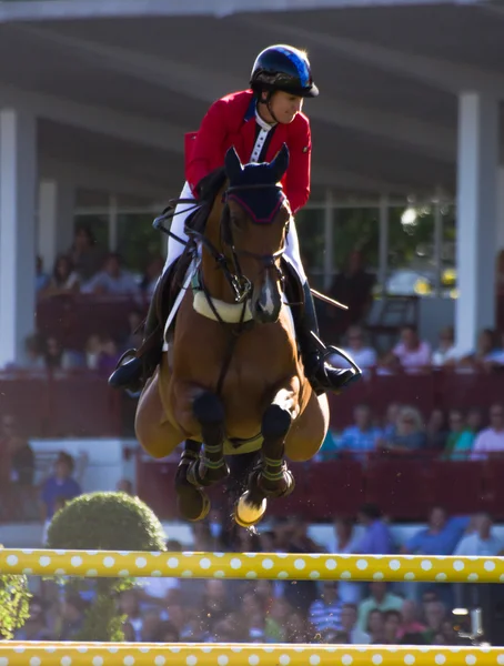 Woman and horse jumping — Stock Photo, Image