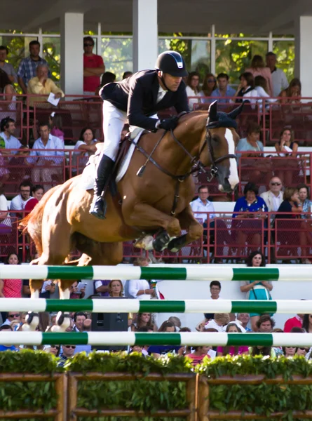 Man and horse jumping — Stock Photo, Image