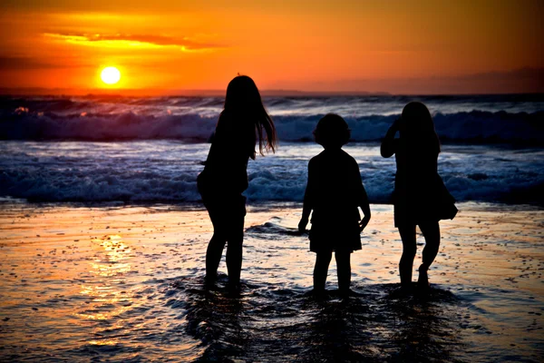Little girls in a sunset — Stock Photo, Image
