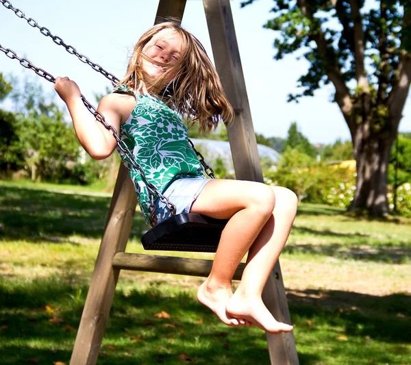 Girl on swing — Stock Photo, Image