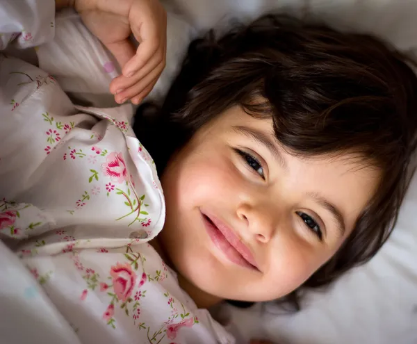 Little girl in bed — Stock Photo, Image