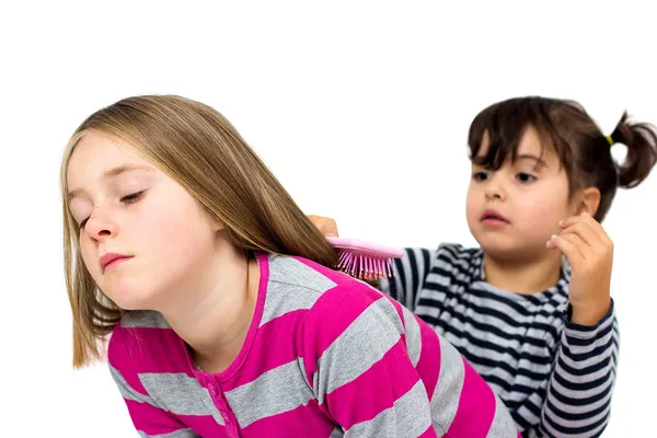 Two little girls combing — Stock Photo, Image