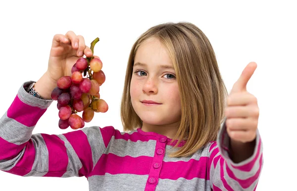 Meisje met druiven — Stockfoto