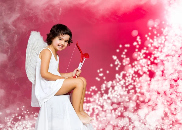 Cupid little girl Stock Image