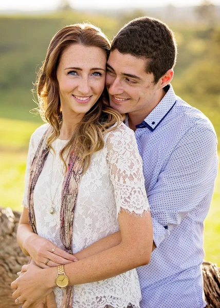 A young couple in embrace — Stock Photo, Image