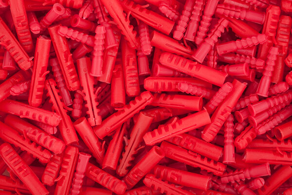Red plastic dowels.