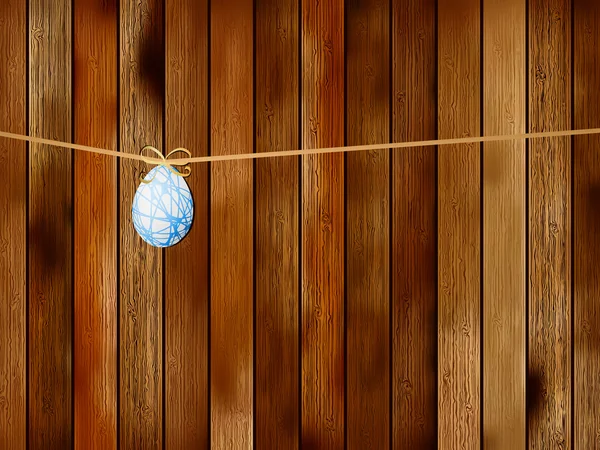 Easter egg on a wooden wall — Stock Vector