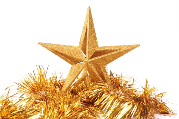 Gouden glinsterende ster vormig kerst ornament geïsoleerd op witte achtergrond — Stockfoto