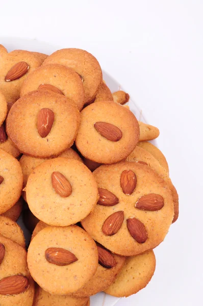 Pile of homemade biscuits isolated on white background. Christmas baking — Stock Photo, Image