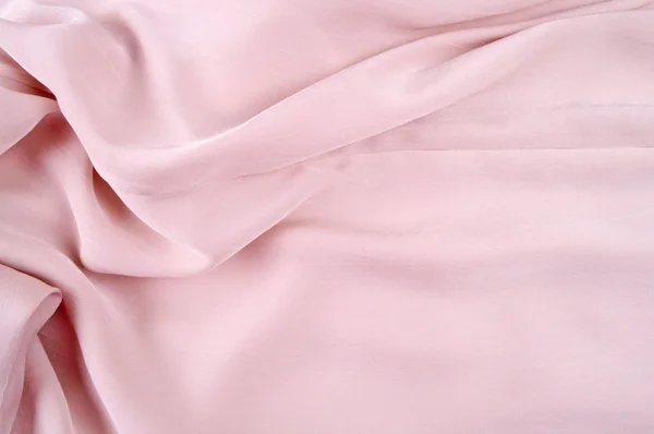 Cortina de seda rosa claro, fondo o textura. Material de seda rosa — Foto de Stock