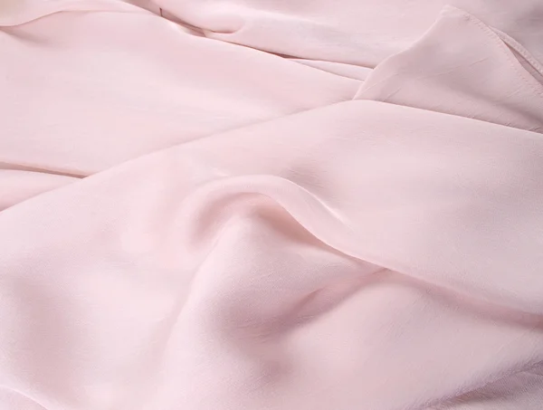Ljus rosa siden drapera, bakgrund eller struktur. Silk material. — Stockfoto