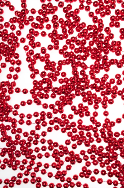 Christmas decoration. Red beads isolated on white background — Stock Photo, Image