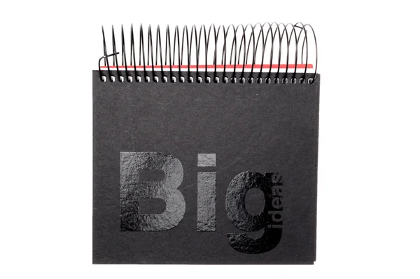 Caderno espiral preto com palavra BIG, isolado em fundo branco — Fotografia de Stock