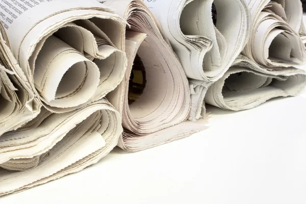 Various newspapers over white background,shallow depth of field — Stock Photo, Image