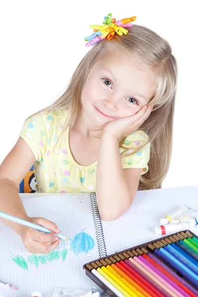 Young girl in school at the desk — Stock Photo, Image