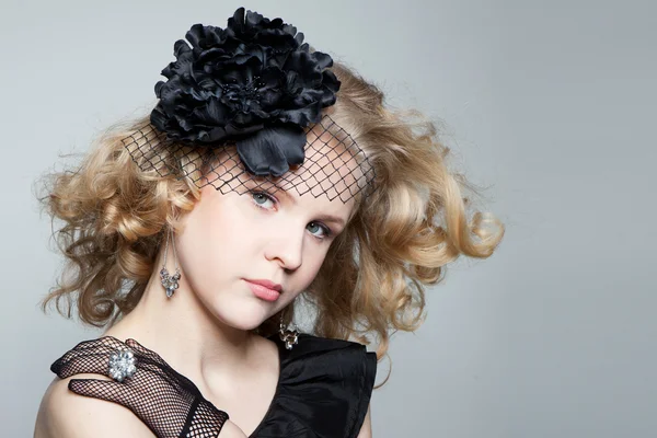 Young blonde girl posing in studio — Stock Photo, Image