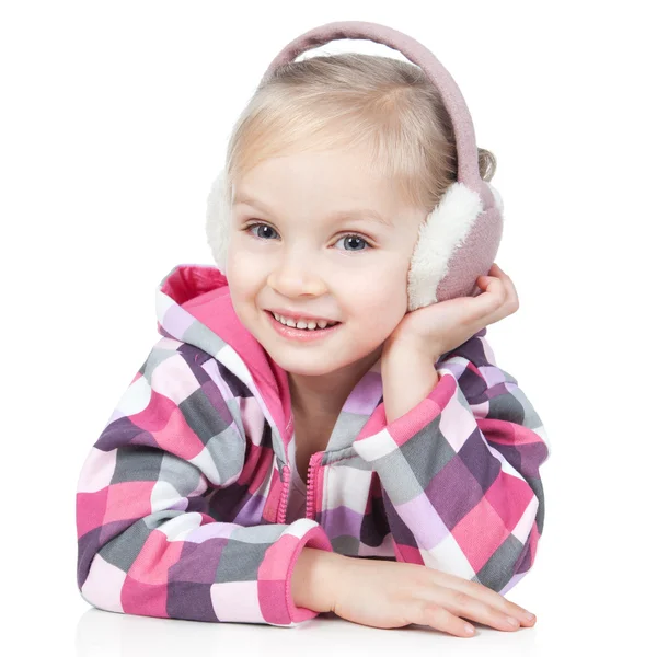 Happy little blonde girl in winter headphones on white — Stock Photo, Image