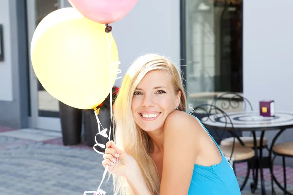 Happy girl with balloons — Stock Photo, Image