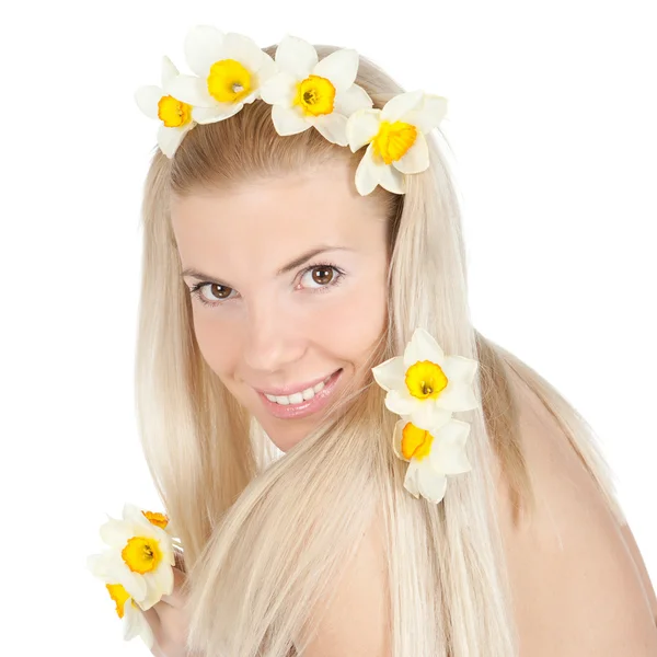Beautiful blond girl with yellow flowers Stock Image