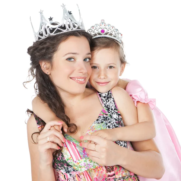 Imagen de madre feliz y niña vestida como princesa Imágenes de stock libres de derechos