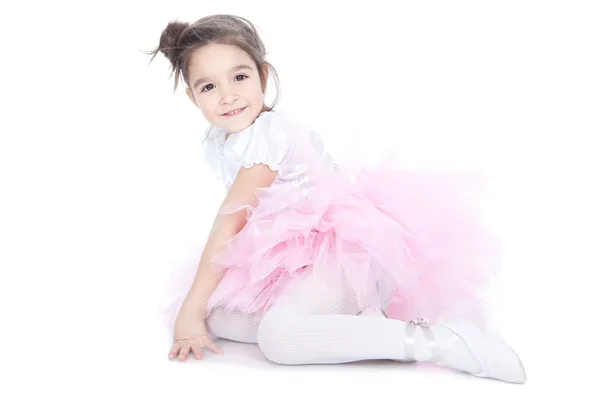 Beautiful little dancer, ballerina in pink dress over white — Stock Photo, Image