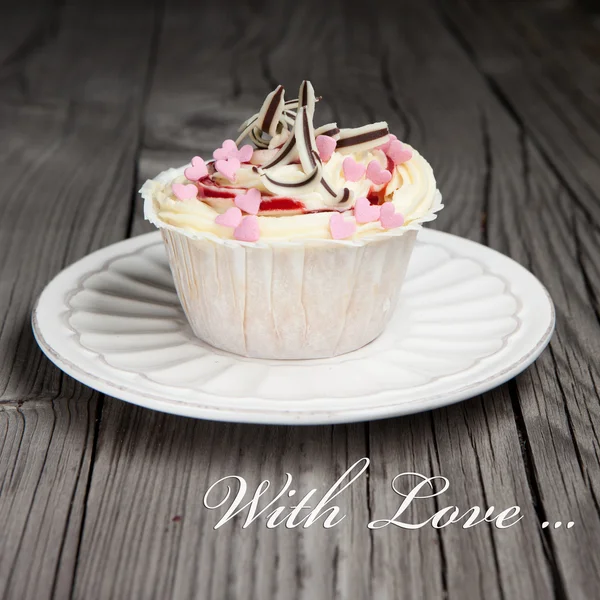 Cupcake de baunilha cupcake em uma mesa — Fotografia de Stock