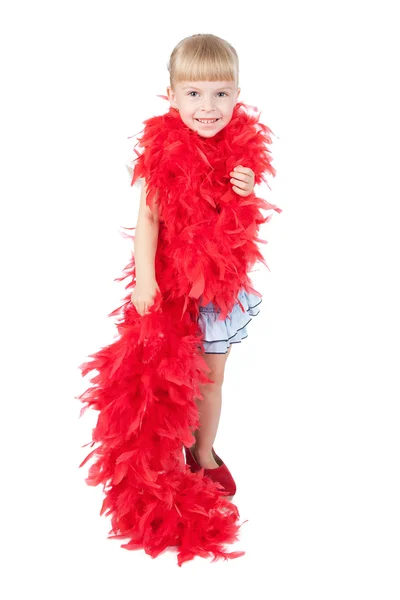 Niña divertida en una boa roja —  Fotos de Stock