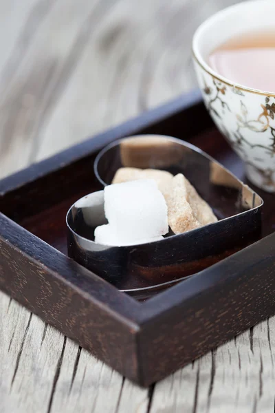 Taza de té con azúcar morena —  Fotos de Stock