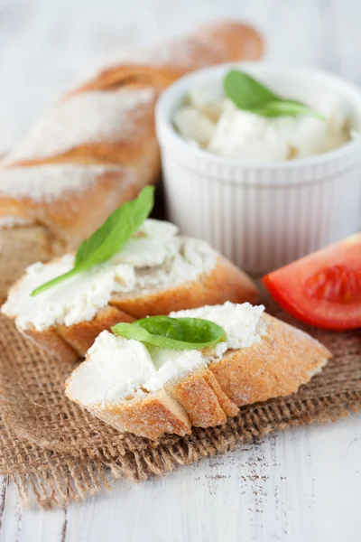 Baguette and cream cheese — Stock Photo, Image