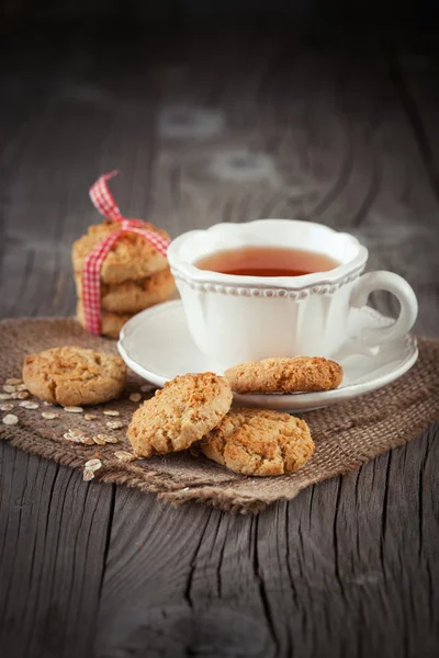 Cookies och kopp te — Stockfoto