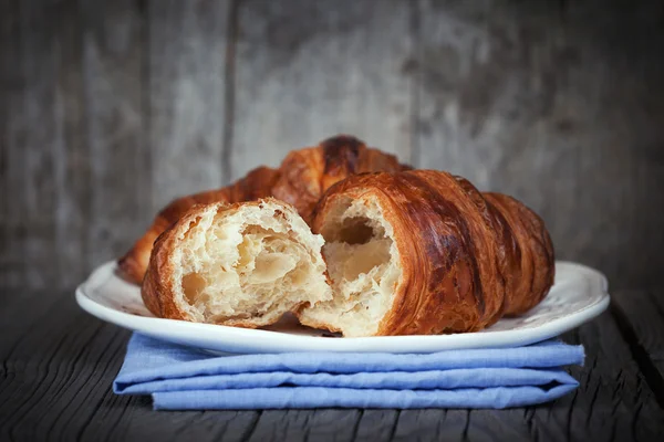 Fresh croissants on a table — Stock Photo, Image