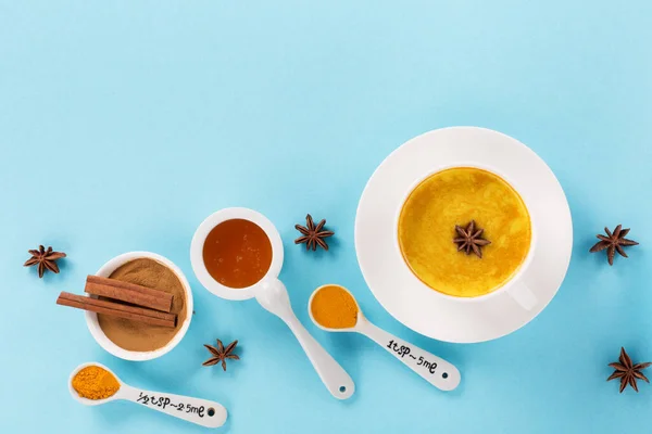 Turmeric Golden Milk Latte Spices Cinnamon Honey Blue Background Top — Stock Photo, Image