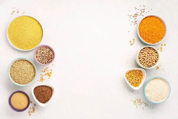 Ancient grain food. Gluten free, Healthy eating, dieting, balanced food concept. Cereals gluten-free, millet, quinoa, polenta, buckwheat, rice, chickpea on white background.