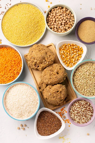 Ancient grain food. Gluten free, Healthy eating, dieting, balanced food concept. Cereals gluten-free, millet, quinoa, polenta, buckwheat, rice, chickpea on white background.