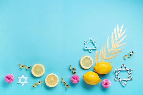 Jewish ritual festival of Sukkot. Holiday Traditional symbols  on blue background.