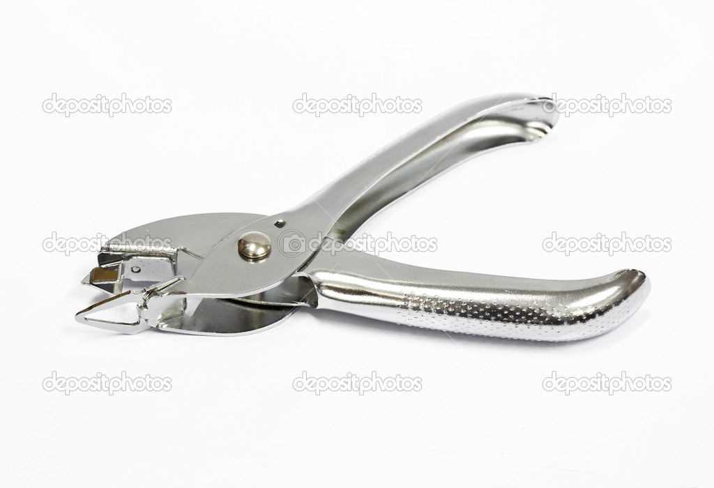 A staple remover on white background