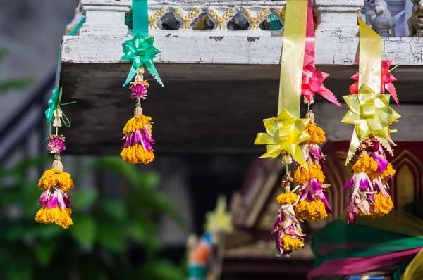 Marigold garland and the joss house — Stock Photo, Image