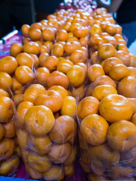 Orange in plastic bag — Stock Photo, Image