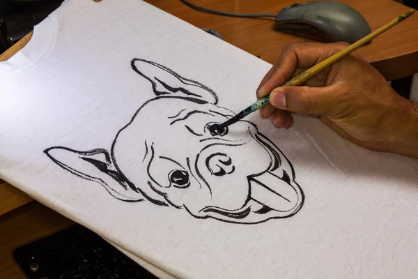 Drawing dog on white shirt — Stock Photo, Image