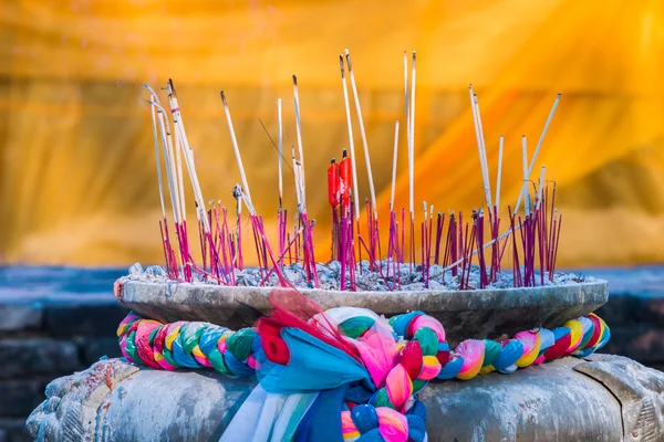 Joss stick and candle in joss stick pot — Stock Photo, Image