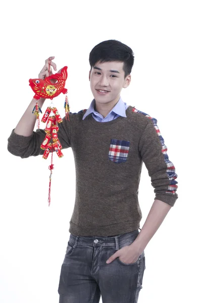 Asiatique adolescent garçon célébrer Nouvel An chinois festival, isolé en blanc — Photo