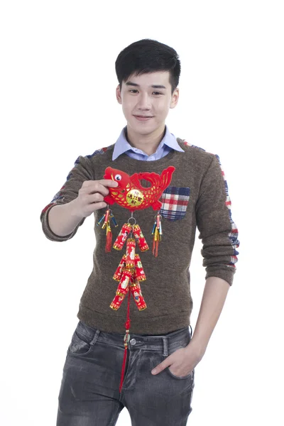 Asian Teenager boy celebrate Chinese new year festival, isolated in white — Stock Photo, Image