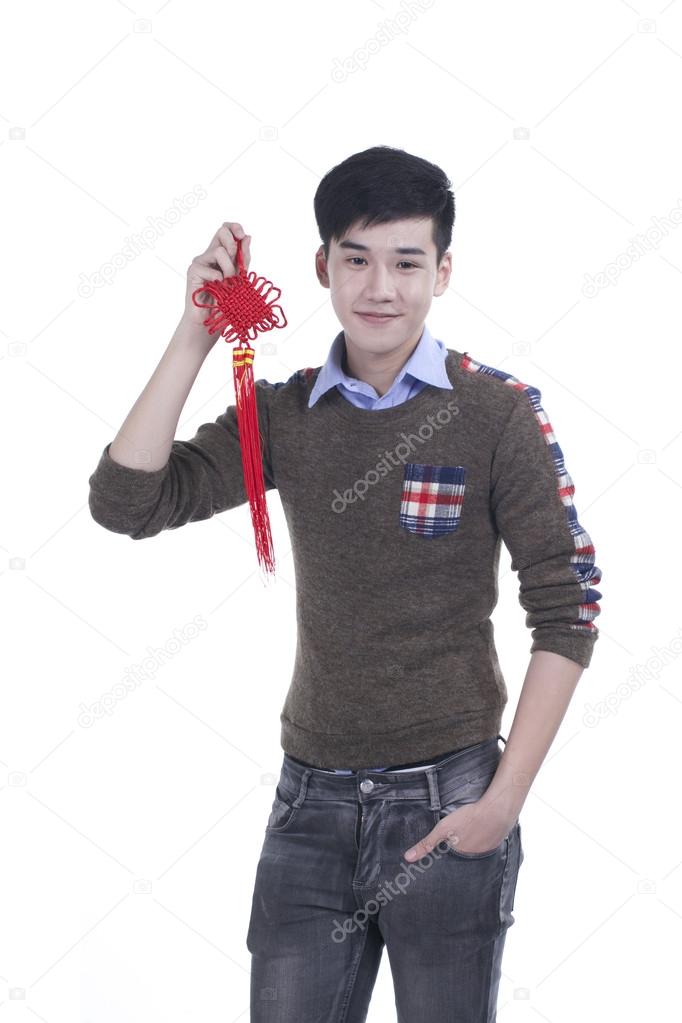 Asian Teenager boy celebrate Chinese new year festival, isolated in white