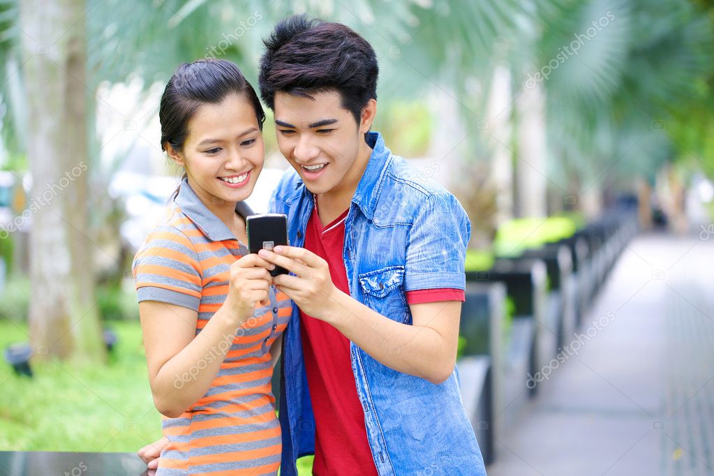Outdoor young asian couple