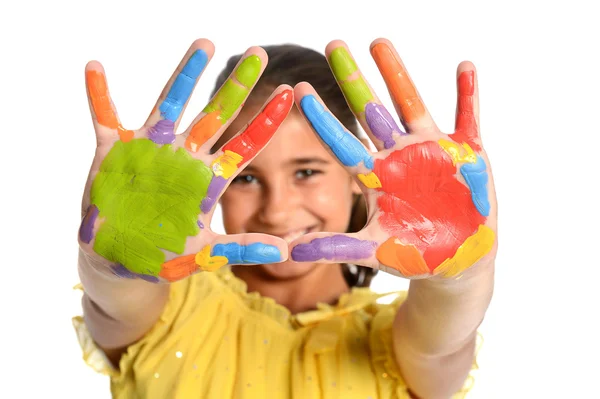 Jeune fille avec les mains peintes — Photo