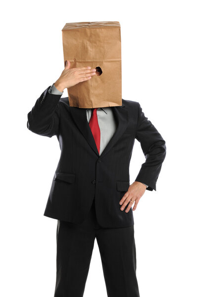 Businessman Hiding Behind Paper Bag